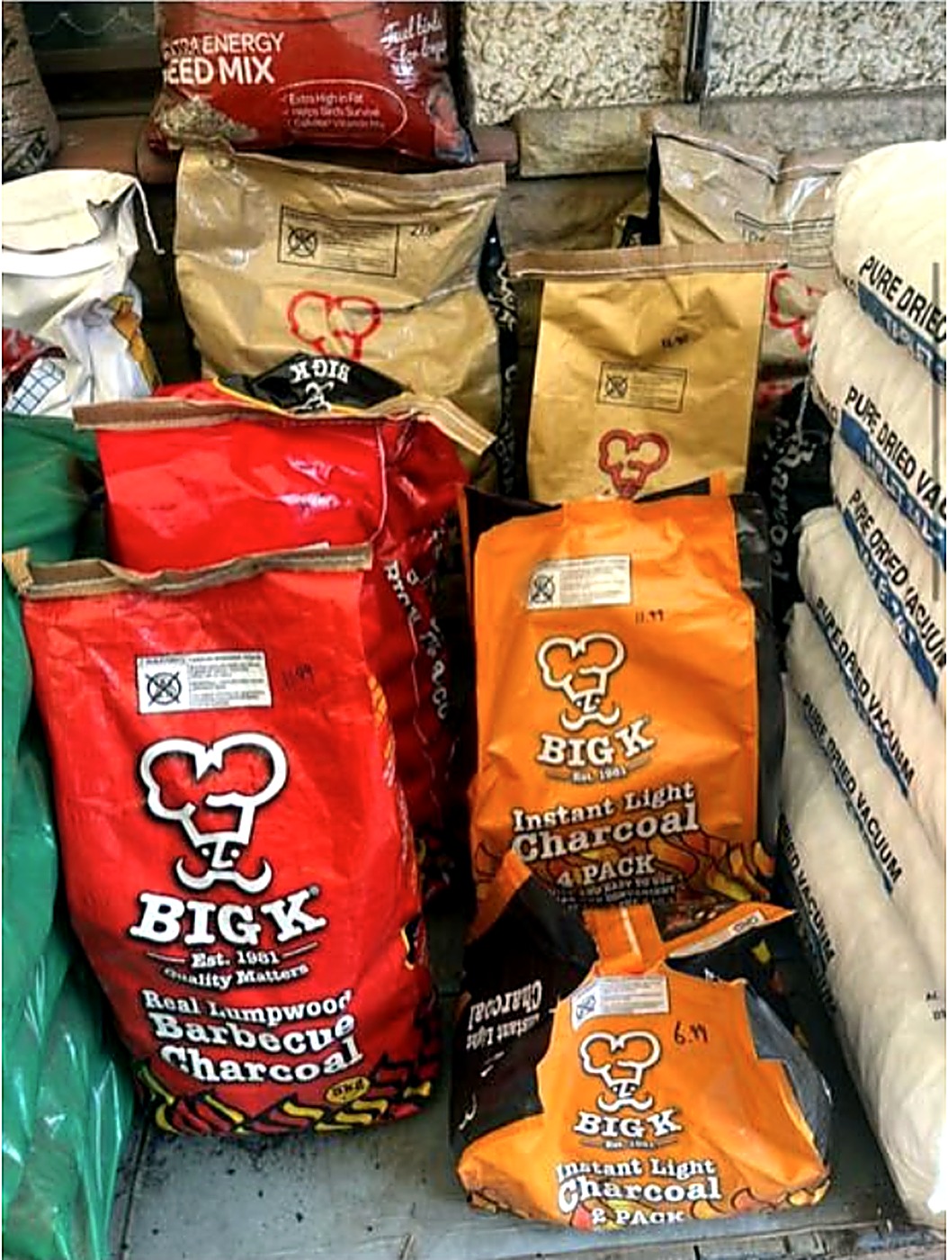 Big K lumpwood barbecue charcoal and instant light charcoal bags in store