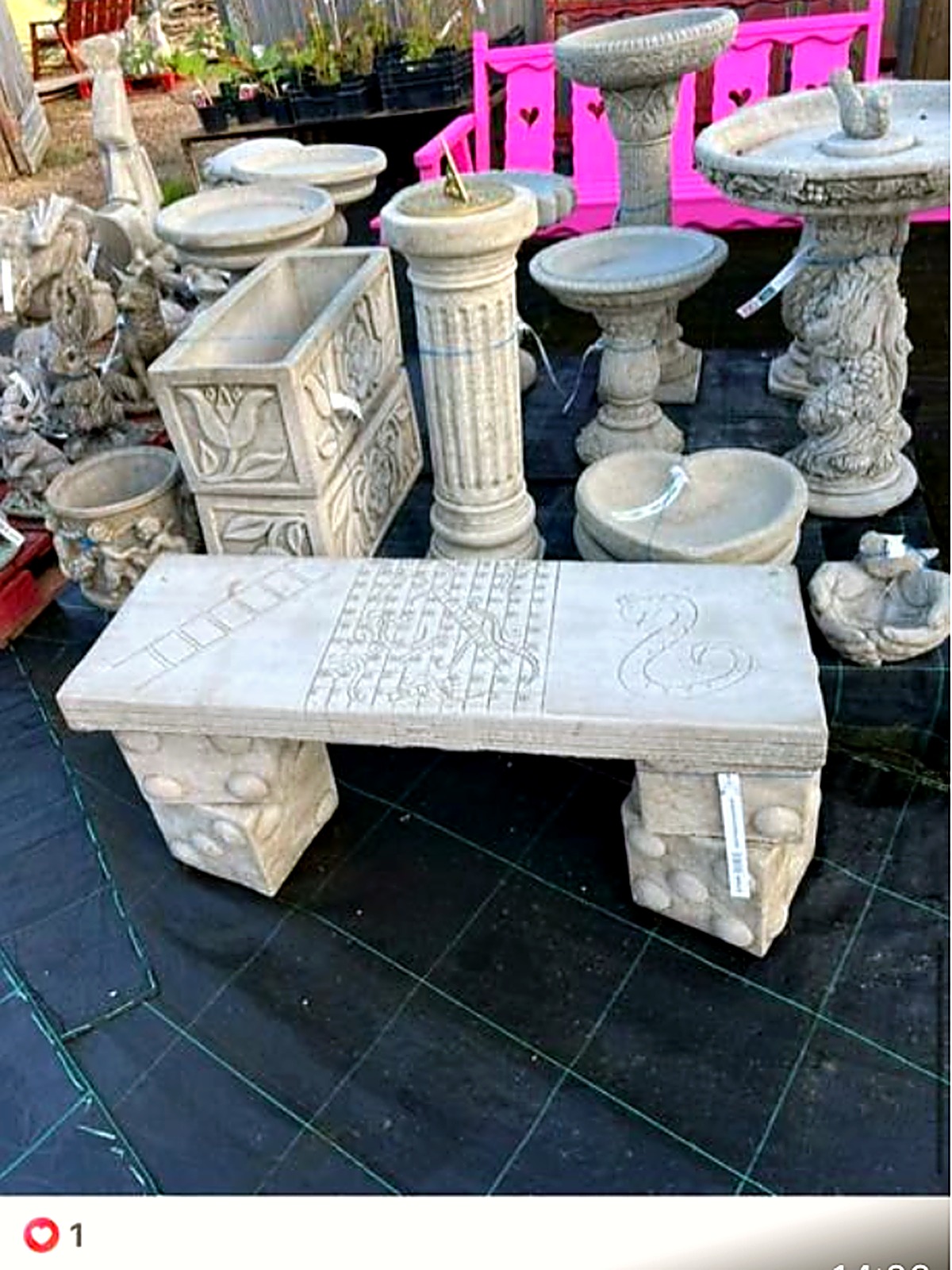 Stone benches, sundials, pedestals and bird baths on display